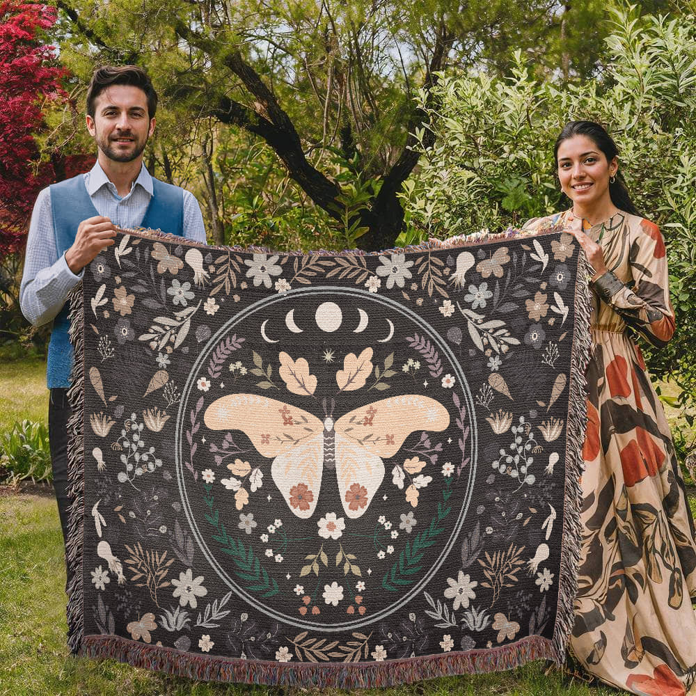Butterfly heirloom blanket shown in outdoor picnic setting - GLiMOT