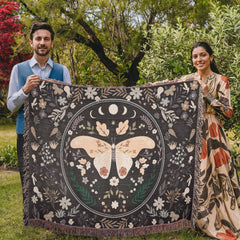 Butterfly heirloom blanket shown in outdoor picnic setting - GLiMOT