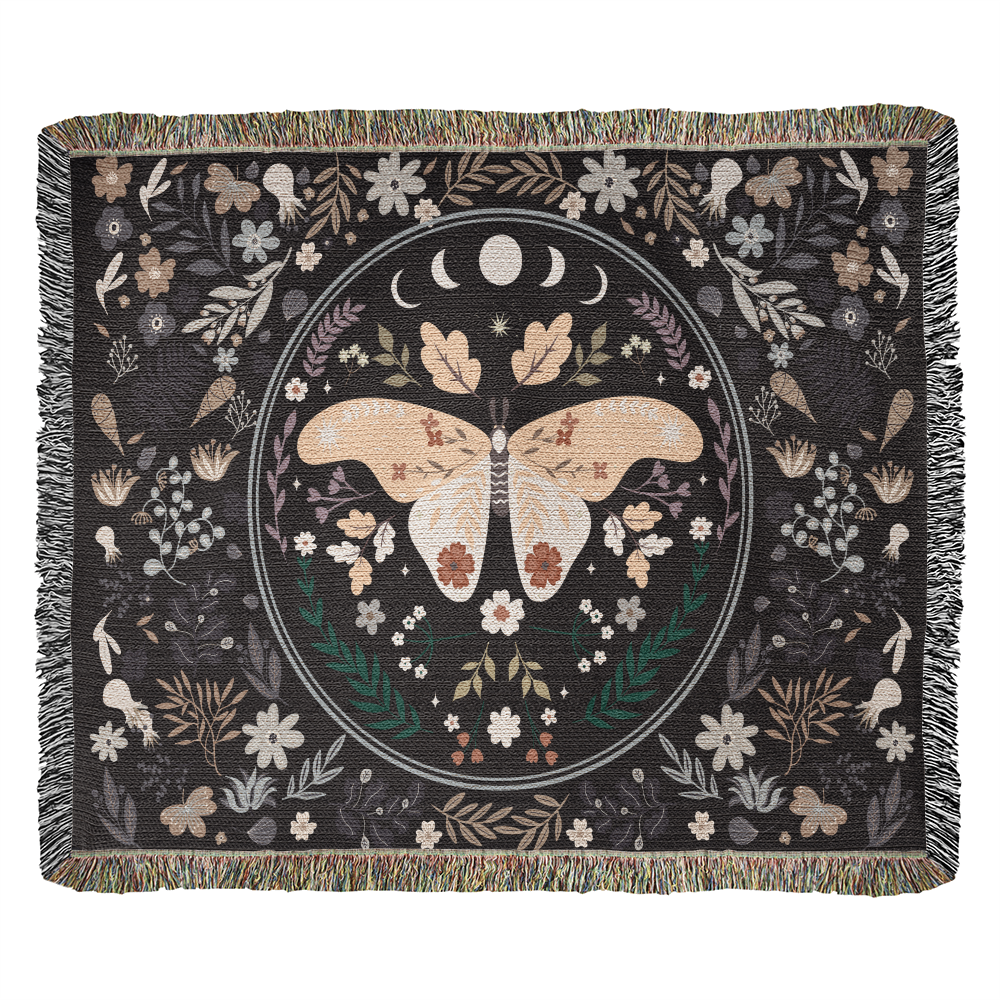 Butterfly heirloom woven blanket draped across a cozy armchair - GLiMOT