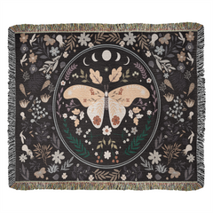 Butterfly heirloom woven blanket draped across a cozy armchair - GLiMOT