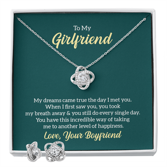 Love knot earring and necklace set with 14K white gold and cubic zirconia