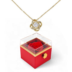 Meticulously preserved red rose inside a clear acrylic gift box, paired with a love knot necklace for a sentimental anniversary surprise.